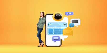 Photo for Young woman standing near big smartphone with AI artificial intelligence virtual assistant chat bot over yellow background. Concept of machine learning - Royalty Free Image