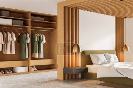Foto de Vista de esquina de la cama interior del dormitorio del hotel y maqueta de lona en blanco, partición de madera y armario con ropa. Muebles de madera minimalistas y diseño elegante. Renderizado 3D - Imagen libre de derechos