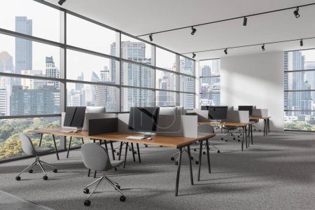 Photo for Corner of modern open space office with white walls, carpeted floor and rows of computer desks with gray chairs standing near panoramic window with cityscape. 3d rendering - Royalty Free Image