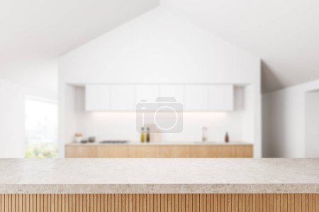 Téléchargez les photos : Table en pierre vide sur fond flou de cuisine intérieure de la maison blanche, espace de cuisson avec armoire et fenêtre panoramique. Maquette de l'espace de copie pour l'affichage du produit. rendu 3D - en image libre de droit