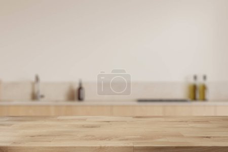 Téléchargez les photos : Table en bois vide sur fond flou de cuisine intérieure élégante, espace de cuisson avec ustensiles de cuisine et cuisinière. Maquette de l'espace de copie pour l'affichage du produit. rendu 3D - en image libre de droit