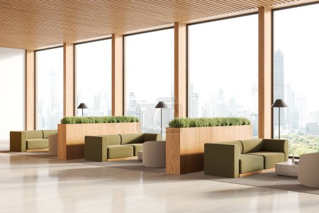 Téléchargez les photos : Intérieur du bureau moderne salle d'attente avec des murs en bois, sol en béton, canapés verts confortables et fauteuils blancs debout près des tables basses. Rendu 3d - en image libre de droit