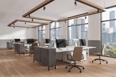 Téléchargez les photos : Coin de bureau de coworking élégant avec des murs blancs et gris, plancher en bois et rangées de tables d'ordinateur avec des chaises beige. Rendu 3d - en image libre de droit