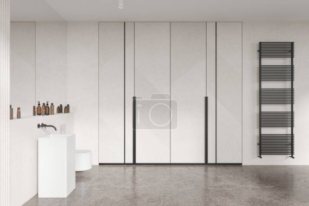 Téléchargez les photos : Minimaliste intérieur de la maison salle de bain avec lavabo et mur accroché toilettes, porte-serviettes et armoire sur le sol en béton. Toilettes élégantes dans un appartement moderne. rendu 3D - en image libre de droit