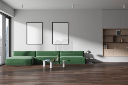 Foto de Elegante hogar interior de la sala de estar con sofá, mesa de centro y estante con decoración de arte en el suelo de madera. Espacio relajante y ventana panorámica en rascacielos. Dos carteles de lona simulados. Renderizado 3D - Imagen libre de derechos