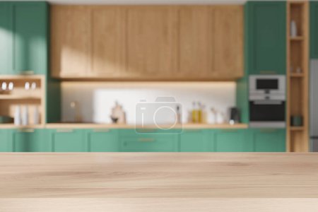 Téléchargez les photos : Maquette table en bois sur fond flou de l'intérieur de la cuisine maison, armoire de cuisine classique de luxe avec ustensiles de cuisine, évier et cuisinière. Maquette de l'espace de copie pour l'affichage du produit. rendu 3D - en image libre de droit