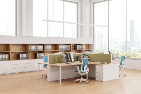 Photo for Corner view of coworking interior with pc desktop on table, shelf with documents on hardwood floor. White work space with panoramic window on Bangkok skyscrapers. 3D rendering - Royalty Free Image