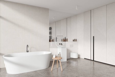Téléchargez les photos : Hôtel de luxe salle de bain intérieure avec WC suspendu au mur, lavabo avec miroir et baignoire. Vue d'angle de l'espace de baignade avec mobilier élégant, sol en béton. rendu 3D - en image libre de droit