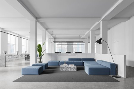 Photo for Interior of modern office waiting room with white walls, concrete floor and comfortable blue sofas standing near coffee table. 3d rendering - Royalty Free Image