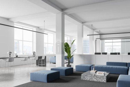 Photo for Corner view of office loft interior with coworking and relax place with blue sofa, panoramic window on Kuala Lumpur skyscrapers. Modern workspace with cozy design. 3D rendering - Royalty Free Image