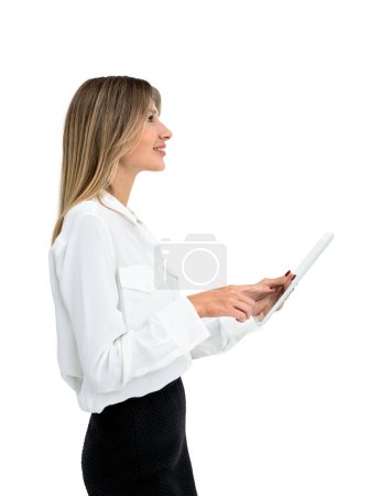 Photo for Businesswoman smiling and finger touch tablet, looking up. Online communication and social media, isolated over white background. Concept of network, connection and technology - Royalty Free Image