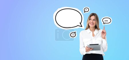Photo for Happy beautiful woman with tablet and finger point up, speech or thought bubbles on blue background. Concept of thoughts, recommendation, chat and opinions - Royalty Free Image