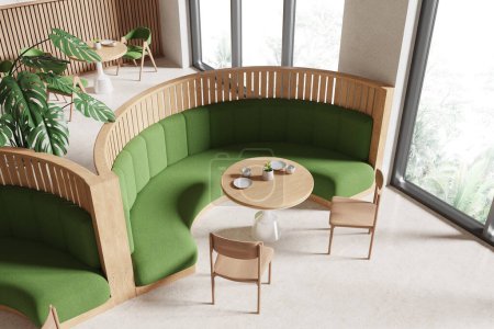 Foto de Vista superior del interior del restaurante con sillas y sofá verde con partición, suelo de hormigón. Elegante espacio para comer cafetería con ventana panorámica en los trópicos. Renderizado 3D - Imagen libre de derechos