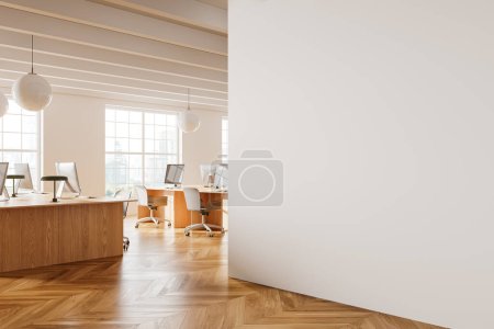 Photo for Corner of modern open space office with white walls, wooden floor, rows of computer desks with white chairs and copy space wall on the right. 3d rendering - Royalty Free Image