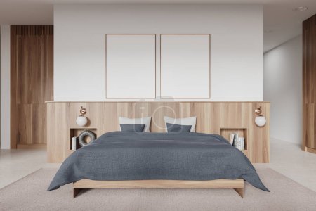 Photo for Stylish home bedroom interior bed and grey bedding, shelf with books and decoration on carpet. Sleep room with two mock up copy space canvas posters in row. 3D rendering - Royalty Free Image
