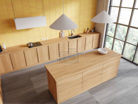 Photo for Top view of yellow home kitchen interior with bar counter, long wooden cooking cabinet with kitchenware on concrete floor. Panoramic window on tropics. 3D rendering - Royalty Free Image