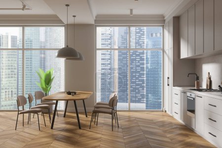 Téléchargez les photos : Cozy intérieur de la cuisine de la maison avec table et chaises, plancher de bois franc. Espace de cuisine élégant avec armoire, fenêtre panoramique sur les gratte-ciel de Singapour. rendu 3D - en image libre de droit