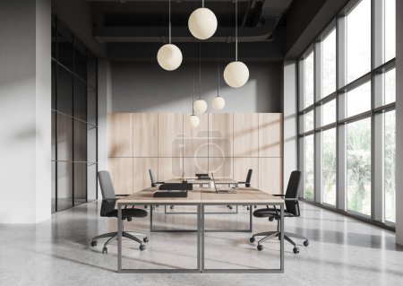 Foto de Elegante interior de oficina con portátil y sillones en fila, piso de hormigón ligero. Trabajo de negocios minimalista con ventana panorámica en los trópicos. Renderizado 3D - Imagen libre de derechos