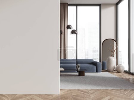 Foto de Interior de la elegante sala de estar con paredes blancas, suelo de madera, cómodo sofá azul de pie cerca de la mesa de café y la pared de espacio de copia a la izquierda. renderizado 3d - Imagen libre de derechos