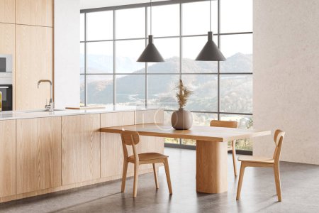 Téléchargez les photos : Vue d'angle de l'intérieur de la cuisine maison avec îlot de bar et armoire, table à manger en bois avec chaises. Design minimaliste et fenêtre panoramique sur la campagne. rendu 3D - en image libre de droit