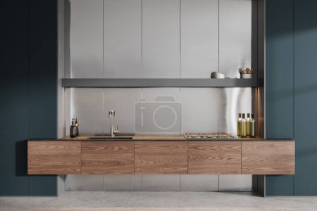 Photo for Interior of minimalistic kitchen with white walls, concrete floor, gray cupboards and cozy wooden cabinets with built in sink and cooker. 3d rendering - Royalty Free Image