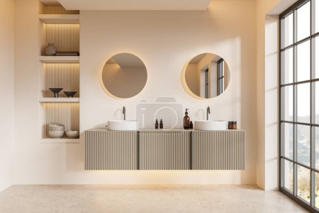 Photo for Elegant home bathroom interior with double sink, shelf and vanity with accessories. Two round mirrors on beige wall. Panoramic window on countryside. 3D rendering - Royalty Free Image