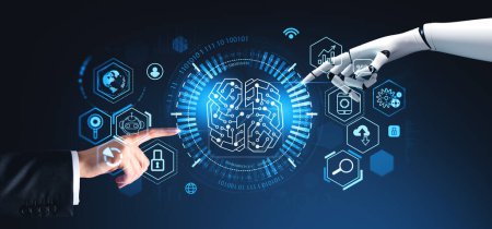 Foto de Las manos del hombre de negocios y el robot tocan el holograma cerebral de inteligencia artificial de IA sobre fondo azul oscuro. Concepto de aprendizaje automático - Imagen libre de derechos