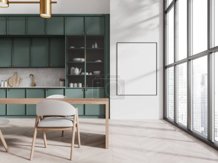 Téléchargez les photos : Intérieur de la cuisine moderne avec murs blancs, sol en bois, armoires et placards verts et longue table à manger avec chaises grises. Affiche maquillée à droite. Rendu 3d - en image libre de droit