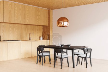 Foto de Esquina vista del interior de la cocina del hogar con mesa de comedor y sillas, vista lateral piso de madera. Comer y cocinar espacio con gabinete de madera y utensilios de cocina. Renderizado 3D - Imagen libre de derechos