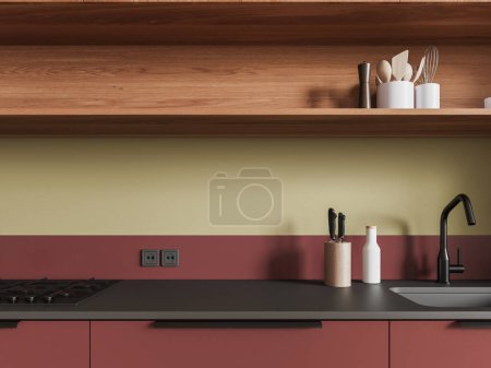 Téléchargez les photos : Intérieur de cuisine moderne avec évier et cuisinière à gaz, comptoir en quartz. Gros plan d'espace de cuisson rouge minimaliste avec ustensiles de cuisine dans un appartement moderne. rendu 3D - en image libre de droit