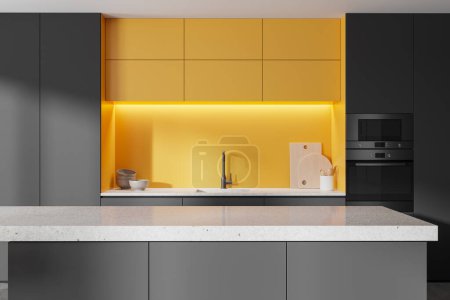 Stylish black and yellow home kitchen interior with bar island, cabinet and shelves, sink and kitchenware. Luxury cooking space with modern furniture. 3D rendering