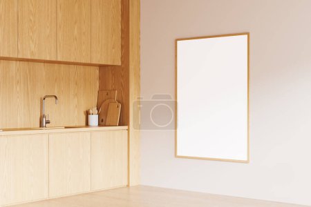 Téléchargez les photos : Vue en angle de l'intérieur de la cuisine maison avec armoire en bois, évier et ustensiles de cuisine sur le comptoir. Affiche en toile maquillée sur mur beige dans un appartement moderne. rendu 3D - en image libre de droit