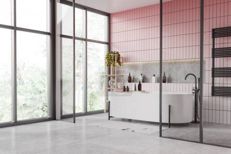 Corner of stylish bathroom with pink tiled walls, tiled floor and comfortable white bathtub standing near panoramic window with tropical view. 3d rendering