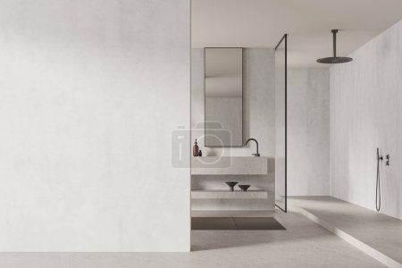 Foto de Interior de baño moderno con paredes de hormigón y suelo, cómodo paseo en ducha, lavabo masivo con espejo vertical y pared de espacio de copia a la izquierda. renderizado 3d - Imagen libre de derechos