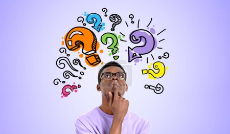 Photo for Black young man student pensive and dreaming portrait, finger on mouth looking up at colorful doodle question marks. Concept of education, business start up and idea - Royalty Free Image