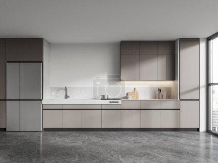 Téléchargez les photos : Élégant intérieur de cuisine à la maison avec armoire de cuisson, réfrigérateur au sol en béton gris. Espace de cuisson dans un appartement moderne avec fenêtre panoramique sur les gratte-ciel. rendu 3D - en image libre de droit
