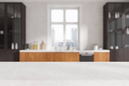 Foto de Mesa de exposición de producto blanco de pie en cocina borrosa con paredes blancas y armarios y armarios de madera. renderizado 3d - Imagen libre de derechos
