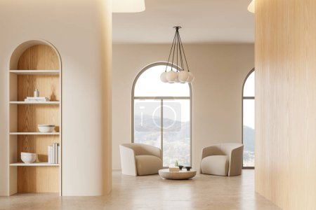 Beige modern home living room interior with armchairs and coffee table, minimalist shelf with books on concrete floor. Panoramic window on countryside. 3D rendering