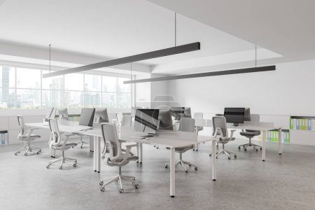 Photo for Corner view of office interior with pc computers on shared desk and chairs, grey concrete floor. Stylish coworking zone with panoramic window on Bangkok skyscrapers. 3D rendering - Royalty Free Image