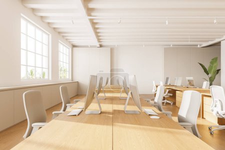 Foto de Interior de coworking moderno con escritorio pc en mesa de madera compartida. Elegante espacio de trabajo beige con muebles minimalistas, tecnología y ventana panorámica en los trópicos. Renderizado 3D - Imagen libre de derechos