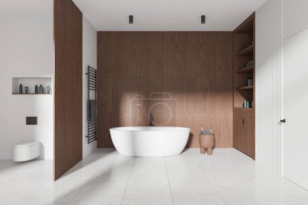Photo for Wooden home bathroom interior with wall hung toilet, bathtub with rail and shelf with accessories. Invisible door to minimalist restroom or bathing space in stylish apartment. 3D rendering - Royalty Free Image