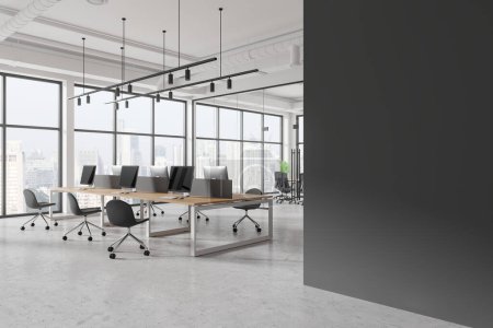 Photo for Corner of stylish white industrial style office interior with glass wall meeting room and rows of desks. Space for education and business with hot desks. Gray copy space wall on the left. 3d rendering - Royalty Free Image