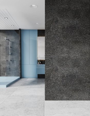 Téléchargez les photos : Intérieur de la salle de bains de luxe de l'hôtel avec des murs gris et bleu clair, sol carrelé, douche à l'italienne, lavabo et modèle de mur d'espace de copie sur la droite. Rendu 3d - en image libre de droit