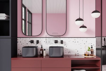 A modern bathroom interior with twin basins, terrazzo walls, and pink cabinets, light. 3D Rendering