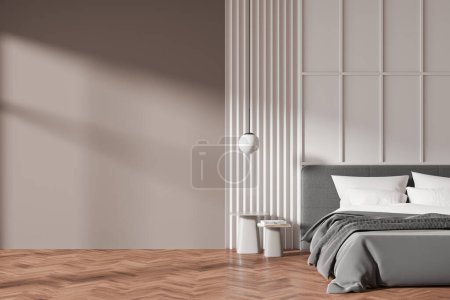 Foto de Interior moderno dormitorio con cama, paneles decorativos de pared, suelos de madera clara, y una pared en blanco, ideal para una maqueta. Renderizado 3D - Imagen libre de derechos