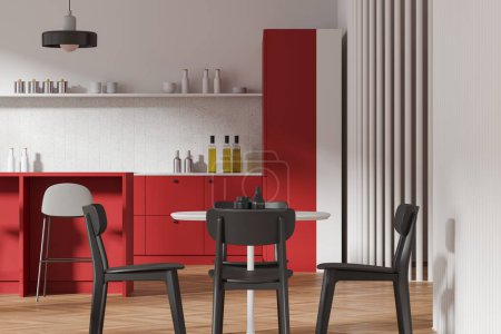 Foto de Interior de la cocina moderna con armarios rojos, una mesa de comedor con sillas y artículos decorativos, en un piso de madera. Renderizado 3D - Imagen libre de derechos