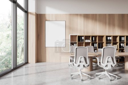 Photo for Minimalist stylish office interior with meeting table and armchairs, shelf with folders. Panoramic window on tropics. Mock up canvas poster on wooden wall. 3D rendering - Royalty Free Image