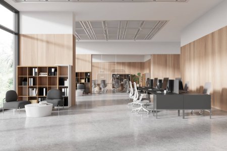Téléchargez les photos : Intérieur de bureau moderne avec des bureaux, des chaises, des ordinateurs et des étagères, sur un fond de plancher en béton et de panneaux de bois, concept de lieu de travail. Rendu 3D - en image libre de droit