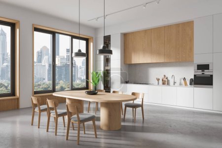 Téléchargez les photos : Une cuisine intérieure moderne avec table à manger en bois, chaises et vue sur la ville à travers de grandes fenêtres, fond clair, concept de design de maison. Rendu 3D - en image libre de droit