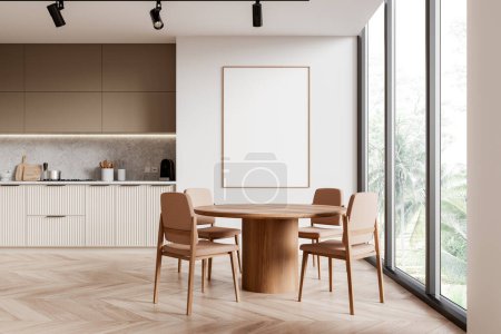 Photo for Interior of stylish kitchen with beige walls, wooden floor, comfortable beige cabinets and round dining table with chairs standing near panoramic window. Vertical mock up poster frame. 3d rendering - Royalty Free Image